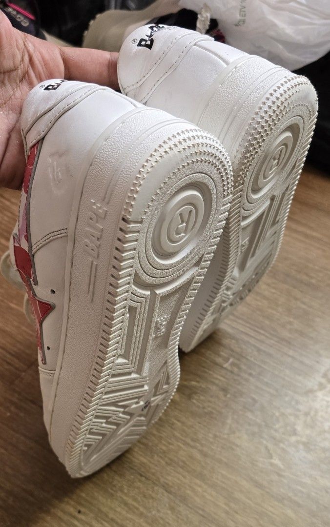 A Bathing Ape Bape Sta Low ABC Camo White Pink (Category: Sneakers) located in Quezon. Submitted by archivesss_666 (Listing ID 1469678340, Image 3). Description: - Authentic bape - Brand: A Bathing Ape (Bape) - Model: Bape Sta Low - Colorway: White leather with pink ABC camo star - Details: White laces, branded silver lace locks, pink camo insoles, Bape Sta tongue tags - Soles: White rubber outsoles with star patterns - Condition: Clean uppers wi