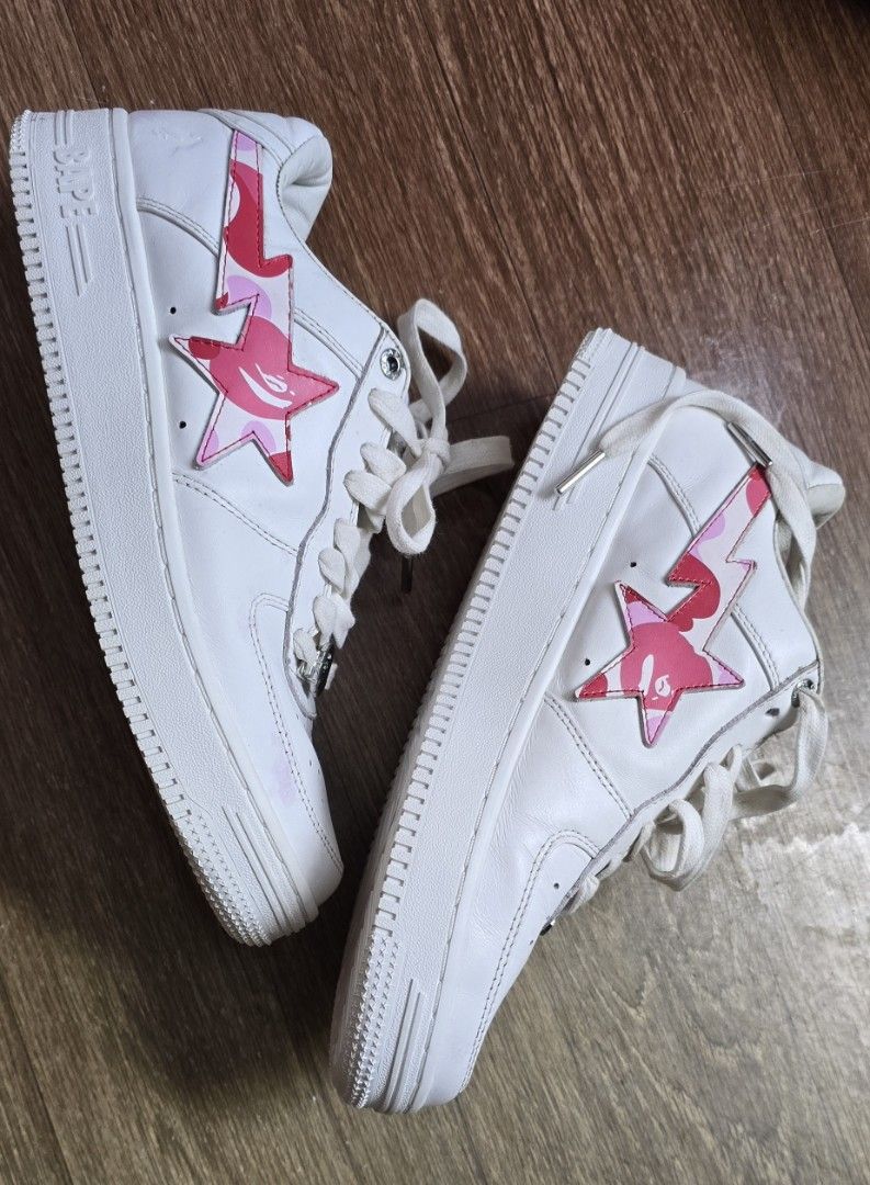 A Bathing Ape Bape Sta Low ABC Camo White Pink (Category: Sneakers) located in Quezon. Submitted by archivesss_666 (Listing ID 1469678340, Image 1). Description: - Authentic bape - Brand: A Bathing Ape (Bape) - Model: Bape Sta Low - Colorway: White leather with pink ABC camo star - Details: White laces, branded silver lace locks, pink camo insoles, Bape Sta tongue tags - Soles: White rubber outsoles with star patterns - Condition: Clean uppers wi