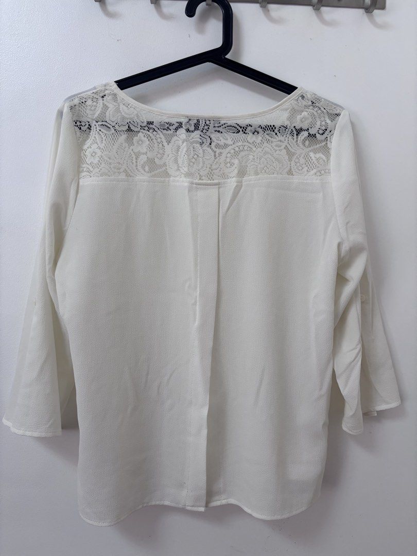 PRE-LOVED: A. Byer White Lace Back Blouse (Category: Blouses) located in Imus. Submitted by jertitay (Listing ID 1469632938, Image 2). Description: RFS: decluttering - Brand: A. Byer - Size: Large - Color: White - Style: Scoop neckline, 3/4 sleeves, and chic high-low hem - Detail: Stunning floral lace panel on the upper back with a center box pleat - Material: Lightweight, airy chiffon-like fabric - Condition: Excellent - Perfect for: Casual wear