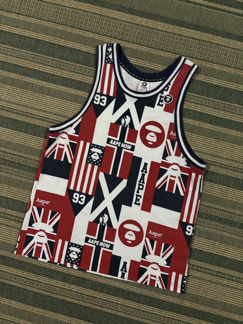 Aape By A Bathing Ape Flag Pattern Tank Top (Category: Tshirts & Polo Shirts ) located in Bulacan. Submitted by charlieflips (Listing ID 1469704413, Image 1). Description: Size large Dimes: 20.5 X 29 Excellent condition With minimal need wash see last photo .