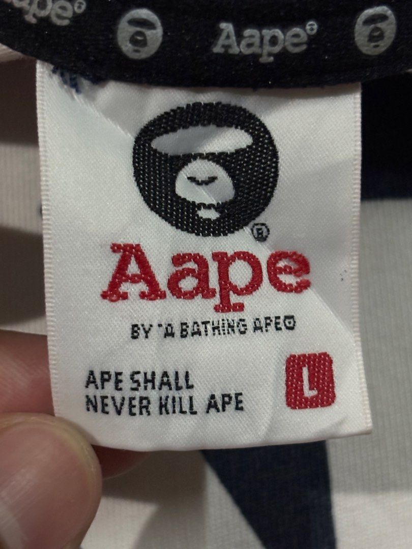Aape By A Bathing Ape Flag Pattern Tank Top (Category: Tshirts & Polo Shirts ) located in Bulacan. Submitted by charlieflips (Listing ID 1469704413, Image 3). Description: Size large Dimes: 20.5 X 29 Excellent condition With minimal need wash see last photo .