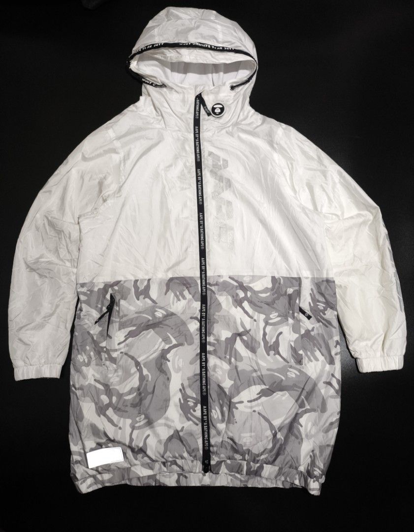 Aape half camou reflective Windbreaker Jacket (double zip) (Category: Coats, Jackets and Outerwear) located in Manila. Submitted by paulchrist27787 (Listing ID 1469662780, Image 1). Description: •Authentic Dimes: W22 x L32 x Sleeve23 M-L best fit Issue: Washable yellow stain Color rate: 8/10 maputi sa personal Condition: 9/10 Price: 1500.