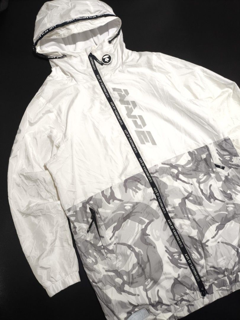 Aape half camou reflective Windbreaker Jacket (double zip) (Category: Coats, Jackets and Outerwear) located in Manila. Submitted by paulchrist27787 (Listing ID 1469662780, Image 2). Description: •Authentic Dimes: W22 x L32 x Sleeve23 M-L best fit Issue: Washable yellow stain Color rate: 8/10 maputi sa personal Condition: 9/10 Price: 1500.