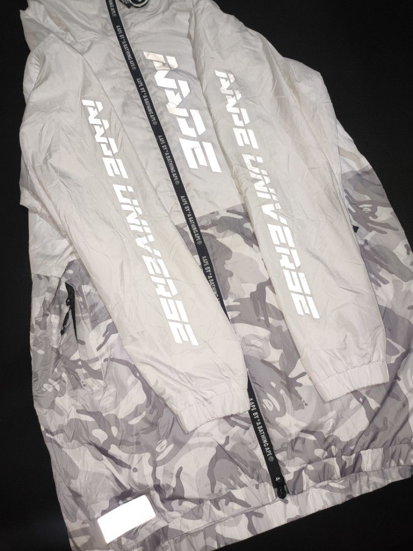 Aape half camou reflective Windbreaker Jacket (double zip) (Category: Coats, Jackets and Outerwear) located in Manila. Submitted by paulchrist27787 (Listing ID 1469662780, Image 3). Description: •Authentic Dimes: W22 x L32 x Sleeve23 M-L best fit Issue: Washable yellow stain Color rate: 8/10 maputi sa personal Condition: 9/10 Price: 1500.