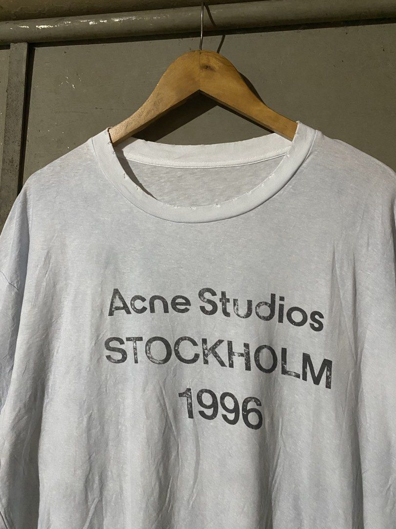 ACNE STUDIOS STOCKHOLM 1996 DISTRESSED DESIGN TEE (Category: Luxury Apparel) located in Naga. Submitted by hubthrift2 (Listing ID 1469601885, Image 3). Description: Details and Measurements Length-28 Width-2 2 Like New condition Issue- missing necktag Color rate-10/10.