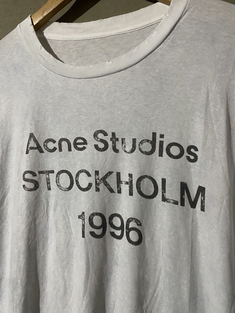 ACNE STUDIOS STOCKHOLM 1996 DISTRESSED DESIGN TEE (Category: Luxury Apparel) located in Naga. Submitted by hubthrift2 (Listing ID 1469601885, Image 2). Description: Details and Measurements Length-28 Width-2 2 Like New condition Issue- missing necktag Color rate-10/10.