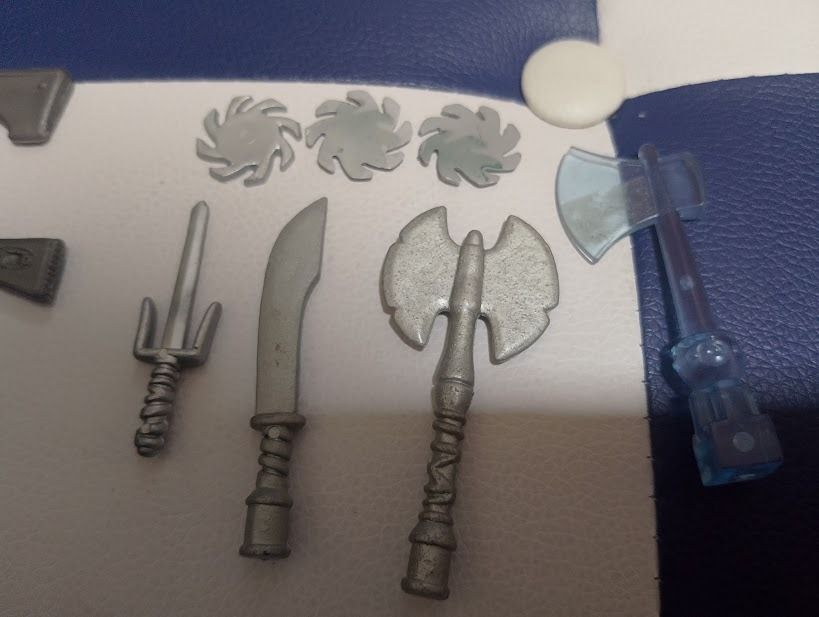 Action Figure Toy Weapons Guns Swords Set (Category: Action & Battle Toys) located in Quezon City. Submitted by susmaryosep1 (Listing ID 1469652953, Image 3). Description: - Lot of assorted miniature action figure weapons - Includes rifles, submachine guns, handguns, sci-fi blasters, throwing stars, knives, and axes - Mostly silver and grey plastic material - Great for figure customizing, diorama setups, or replacing lost accessories - All pieces