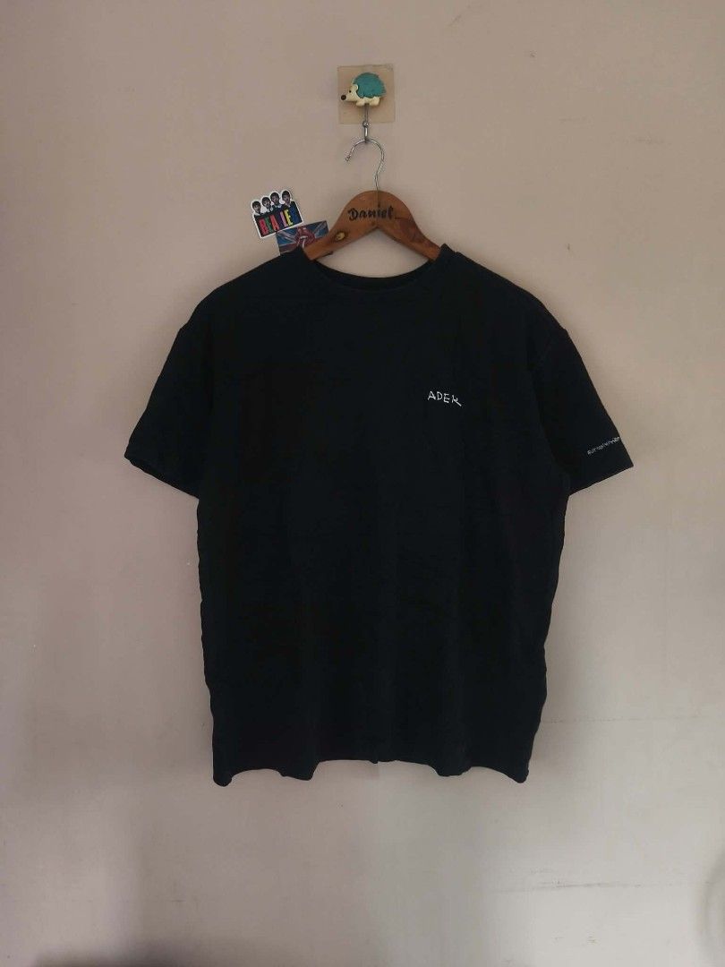 Ader Error Black Graphic T-Shirt (Category: Tshirts & Polo Shirts ) located in Manila. Submitted by cookthrift (Listing ID 1469576643, Image 1). Description: - Brand: Ader Error - Collection: 2020 Fall/Winter - Color: Black - Fit: Classic fit, comfortable 100% cotton - Details: Small chest embroidery, sleeve text 'BUT NEAR MISSED THINGS', and large back text print - Authenticity: Includes signature blue inner brand tag - Condition: Great streetwe