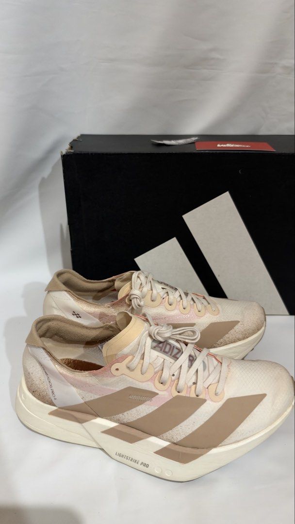 Adidas Adizero Adios Pro 4 (Category: Sneakers) located in San Fernando. Submitted by luxchic_pampanga (Listing ID 1469603039, Image 3). Description: original used twice (total of 5km only) w box purchased from walk with us on ig originally bought for ₱11,500 no issue.