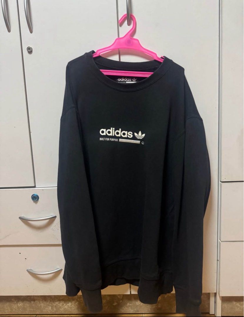 Adidas Black Crewneck Sweatshirt (Category: Coats, Jackets and Outerwear) located in Manila. Submitted by quintessesommerset (Listing ID 1469681080, Image 1). Description: - Brand: Adidas size M but can fit to XL - Style: Crewneck sweatshirt / Pullover - Color: Black with white graphic print ('BUILT FOR PURPOSE') - Size: Medium (M) - Details: Ribbed cuffs and hem - Origin: Made in Vietnam - Condition: Great for casual everyday wear - Fast shippin