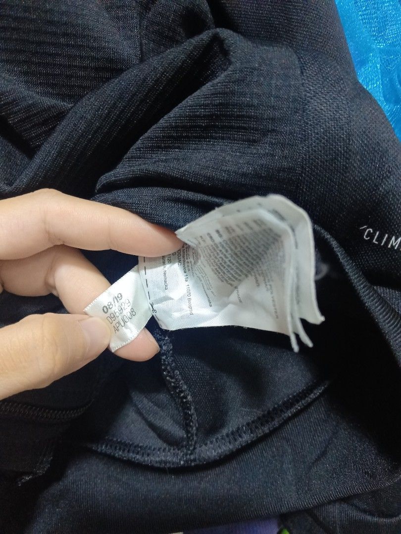 Adidas Black Track Jacket with White Stripes Size S (Category: Coats, Jackets and Outerwear) located in General Trias. Submitted by felgemdedi33956 (Listing ID 1469616834, Image 3). Description: - Brand: Adidas - Style: Track jacket with full zip, mock neck, and zipped pockets - Color/Design: Black with classic white three stripes and 'BETTY' text print on the left chest - Size: Small (tag) - Material: 100% polyester.