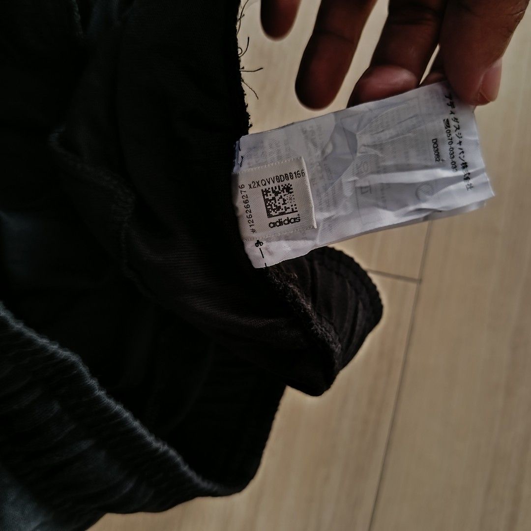 Adidas Black Track Pants (Category: Joggers) located in Manila. Submitted by ghello99 (Listing ID 1469628033, Image 3). Description: - Brand: Adidas - Color: Classic Black with bold white logo on left lower leg - Size: Asia A/L (Height 180/86A) - Fit: Elastic waistband with adjustable drawstring - Condition: Great / Well-maintained - Origin: Made in China - Best for: Gym workouts, sports, or casual streetwear/lounging.