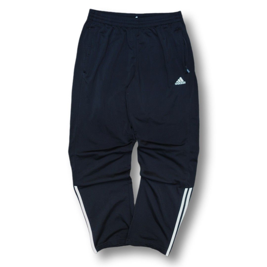 Adidas Black Track Pants Zip Pockets Three Stripes (Category: Joggers) located in Cavite. Submitted by spinfits (Listing ID 1469711226, Image 2). Description: - Authentic Adidas track pants in classic black - Stylish white stripes near the lower legs - Secure zipped side pockets for your essentials - Comfortable elastic waistband for easy wear - Standard fit, ideal for workouts or everyday lounging Dimensions (Inches) Size: 28-36 Legth: 40 Thigh: