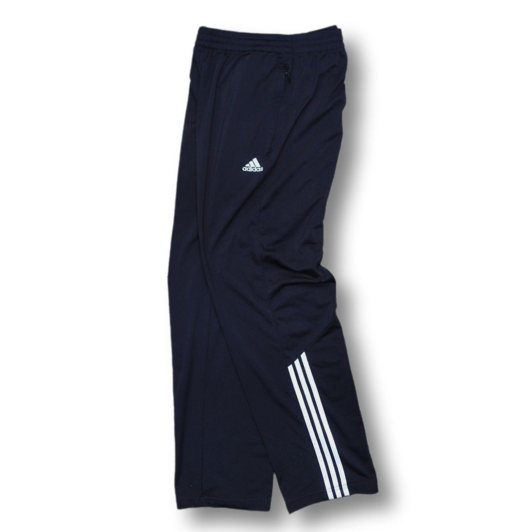 Adidas Black Track Pants Zip Pockets Three Stripes (Category: Joggers) located in Cavite. Submitted by spinfits (Listing ID 1469711226, Image 1). Description: - Authentic Adidas track pants in classic black - Stylish white stripes near the lower legs - Secure zipped side pockets for your essentials - Comfortable elastic waistband for easy wear - Standard fit, ideal for workouts or everyday lounging Dimensions (Inches) Size: 28-36 Legth: 40 Thigh: