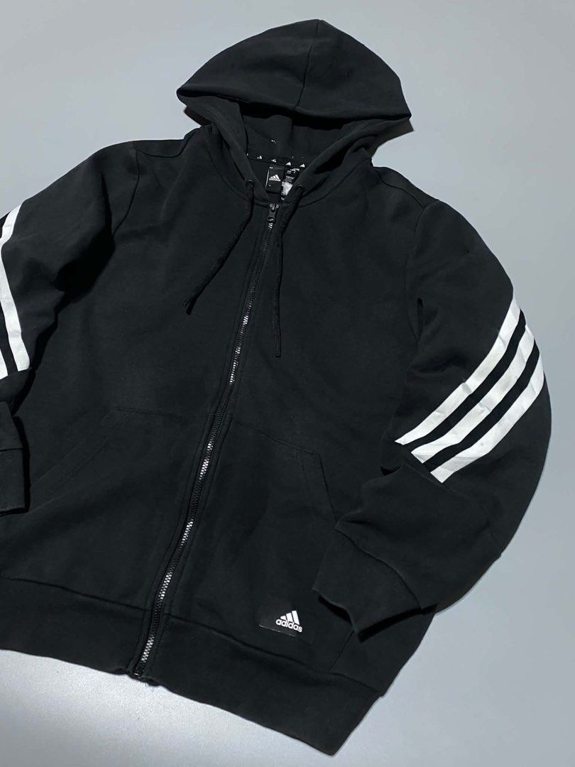 Adidas Hoodie Jacket (Category: Coats, Jackets and Outerwear) located in Manila. Submitted by a.stmngo (Listing ID 1469705767, Image 3). Description: Size 2xl on tag, best fit to Large Width 24 inches Length 26 inches Needwash Good Condition 📍Manage your expectation. Item is thrifted. 📍Nagcarlan, Laguna.