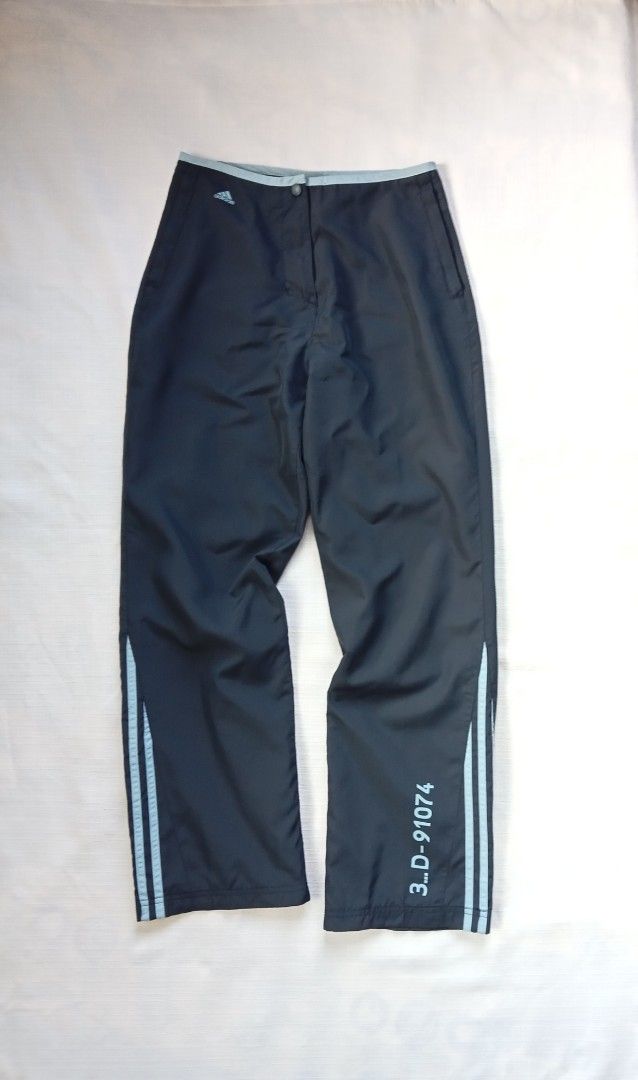 Adidas navy blue y2k trackpants (Category: Activewear) located in Bagabag. Submitted by thrift_stories96 (Listing ID 1469710857, Image 2). Description: Adidas navy blue y2k trackpants Fits Unisex Small mens Medium womens Waistline - 28 Length - 39 Leg opening - 8.5 Condition - 9/10 Color and cloth - 9.5/10 Flaw - minimal hairline sa number 3 na print sa back.Kindly check posted photo..