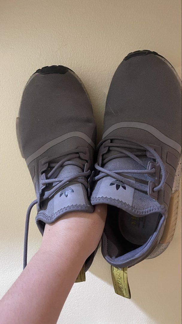 Adidas NMD Sneakers Grey Size US 5.5 (Category: Sneakers) located in Manila. Submitted by heyuzlh (Listing ID 1469705789, Image 1). Description: - Brand/Model: Adidas NMD - Color: Grey with yellow accents and olive heel pull tabs - Size: US 5.5 / UK 5 / FR 38 - Material: Breathable knit upper with speckled Boost midsole - Condition: Pre-owned with minor wear on soles and midsoles #preloved #shoes #adidas.