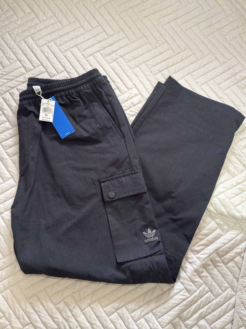 Adidas Originals Script Cargo Pants (Category: Trousers) located in Paranaque City. Submitted by rockydlc (Listing ID 1469616428, Image 1). Description: For Sale Adidas Originals Script Cargo Pants Size XL Brand New from Australia Waist 18in - Length 42in Merville Paranaque location J&T / Lalamove Gcash / BPI.