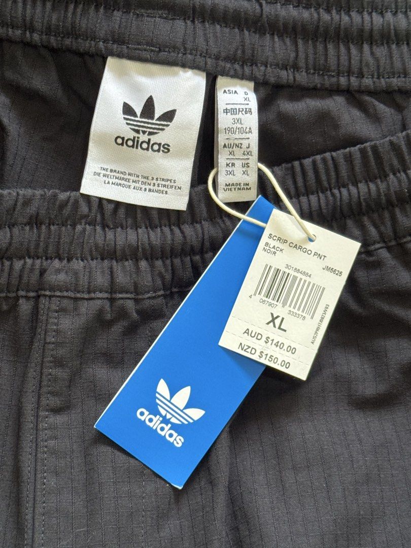 Adidas Originals Script Cargo Pants (Category: Trousers) located in Paranaque City. Submitted by rockydlc (Listing ID 1469616428, Image 2). Description: For Sale Adidas Originals Script Cargo Pants Size XL Brand New from Australia Waist 18in - Length 42in Merville Paranaque location J&T / Lalamove Gcash / BPI.