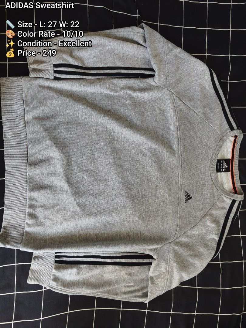 ADIDAS Performance Essentials Gray Sweatshirt Size L (Category: Coats, Jackets and Outerwear) located in Manila. Submitted by gelog2 (Listing ID 1469706890, Image 1). Description: - Brand: Adidas (Performance Essentials Line) - Color: Gray with black sleeve stripes and orange collar piping - Size: L (Length: 27", Width: 22") - Condition: 10/10 (Flawless, like new) - Details: Embroidered Adidas .