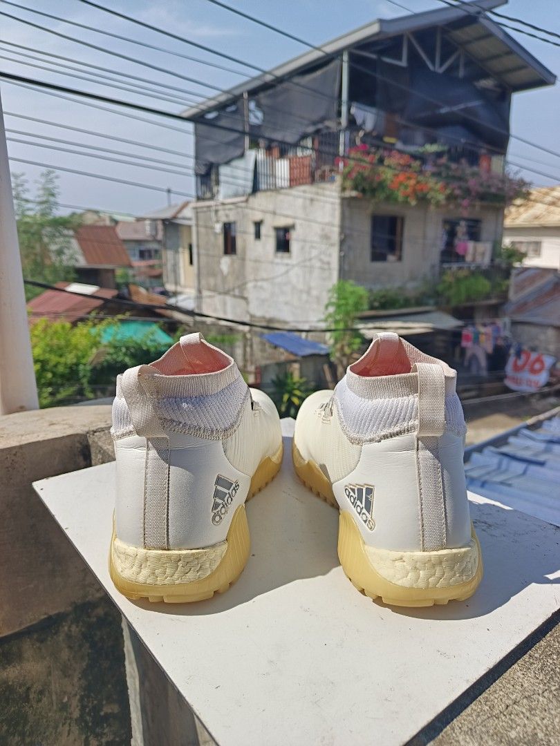 Adidas Predator Tango 18+ TF White Orange (Category: Sneakers) located in Davao. Submitted by judethrifter (Listing ID 1469596282, Image 3). Description: - Model: Adidas Predator Tango 18+ Turf Football Shoes - Colorway: White and orange with classic gum soles - Fit & Tech: Laceless collar with innovative BOA dial lacing system - Cushioning: Responsive Boost midsole for maximum comfort - Details: Red insoles featuring white Boost branding - Condi