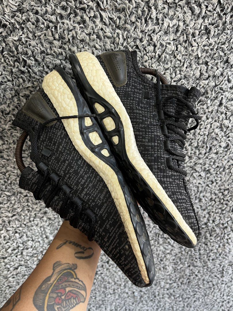 adidas PureBoost "Core Black" | Size 9mens (Category: Sneakers) located in General Trias. Submitted by zrchustle.604 (Listing ID 1469758508, Image 3). Description: the adidas PureBoost "Core Black" (Style Code: BA8899). Released as a popular lifestyle runner, it features a flexible circular knit upper with an asymmetrical lacing setup designed to minimize pressure across the top of your foot. The textured cushioning beneath the upper is adidas' s