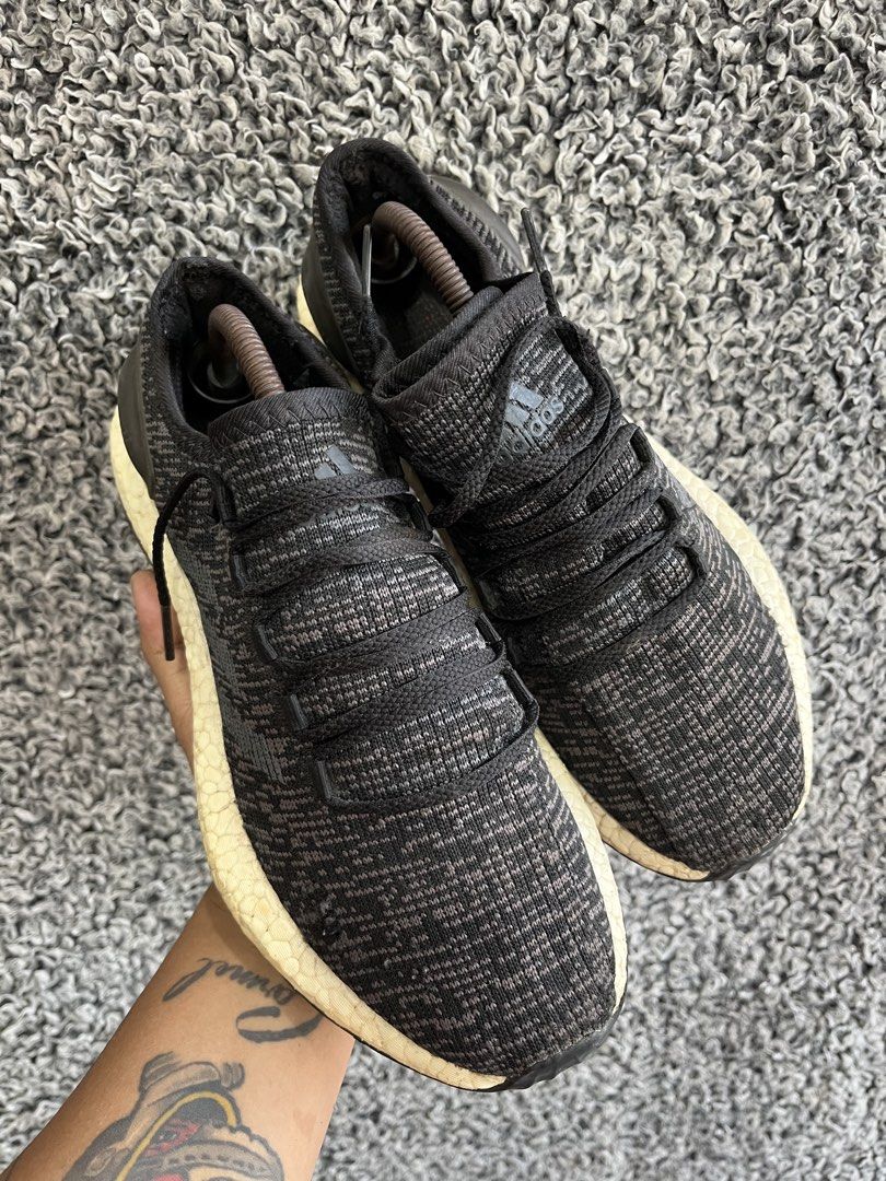 adidas PureBoost "Core Black" | Size 9mens (Category: Sneakers) located in General Trias. Submitted by zrchustle.604 (Listing ID 1469758508, Image 2). Description: the adidas PureBoost "Core Black" (Style Code: BA8899). Released as a popular lifestyle runner, it features a flexible circular knit upper with an asymmetrical lacing setup designed to minimize pressure across the top of your foot. The textured cushioning beneath the upper is adidas' s