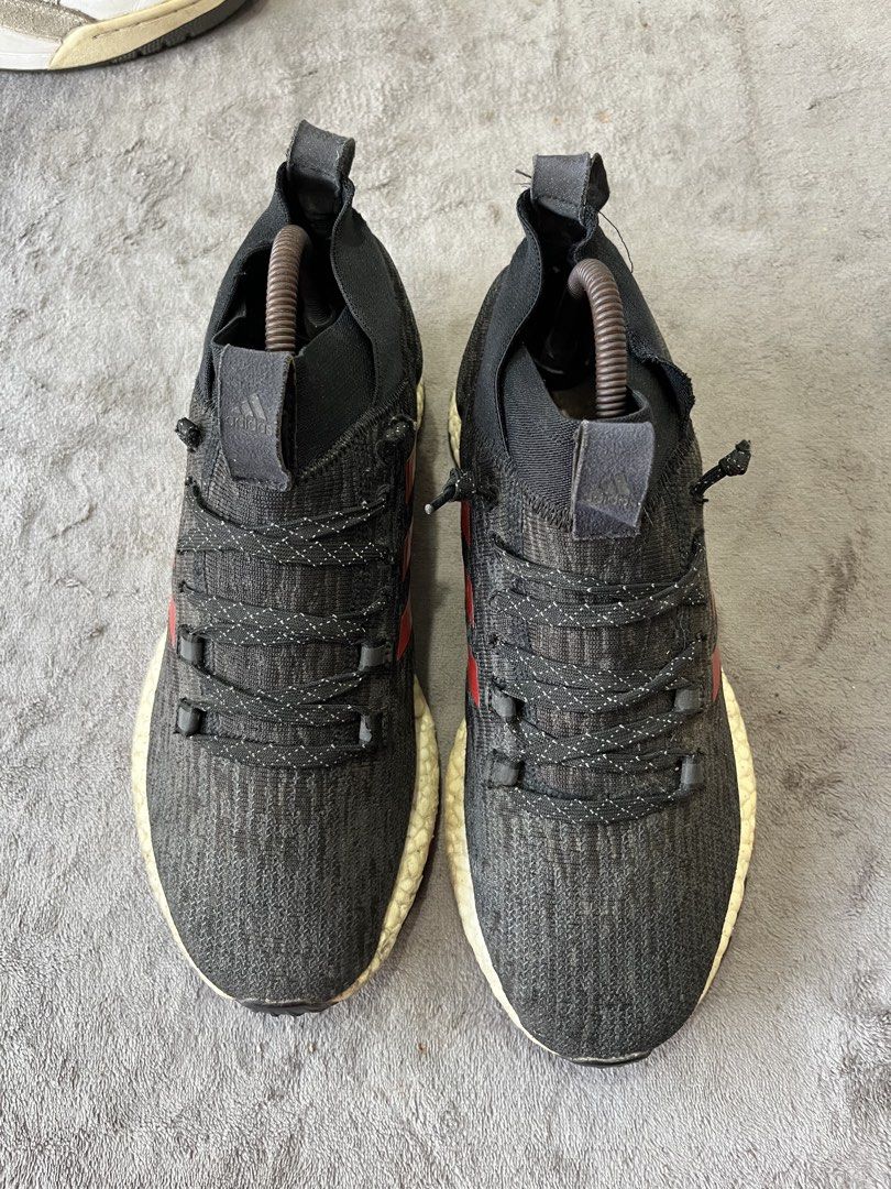 adidas Pureboost RBL | Size 41 (Category: Sneakers) located in General Trias. Submitted by zrchustle.604 (Listing ID 1469757006, Image 2). Description: adidas Pureboost RBL (specifically the "Black Scarlet" or "Black Red" colorway). Designed as a winterized running shoe, it features a water-repellent adaptive knit upper, an extended ankle collar to keep out cold air, and an all-terrain outsole paired with full-length Boost cushioning..