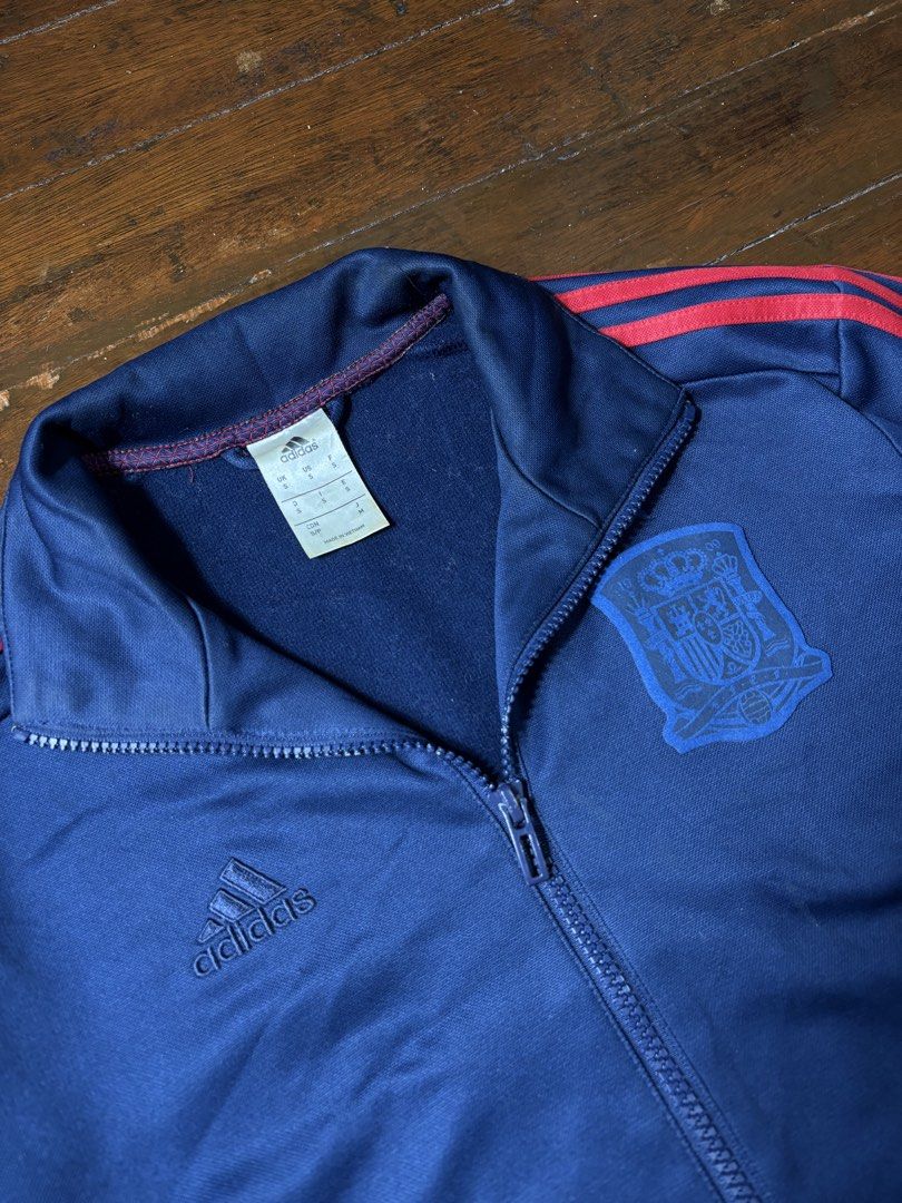 Adidas Spain Track Jacket (Category: Coats, Jackets and Outerwear) located in Manila. Submitted by earlylifecrisis (Listing ID 1469670714, Image 2). Description: Sz Small Condition 9/10 Measure it by inch Width: 20 Length: 27.5 Shoulder:17 Sleeve: 25.5 Bust: Hem: •Refund / Returns not allowed allowed •Please do check the dimensions size on labels sometimes are not accurate on the sizing •Ask me before purchasing.