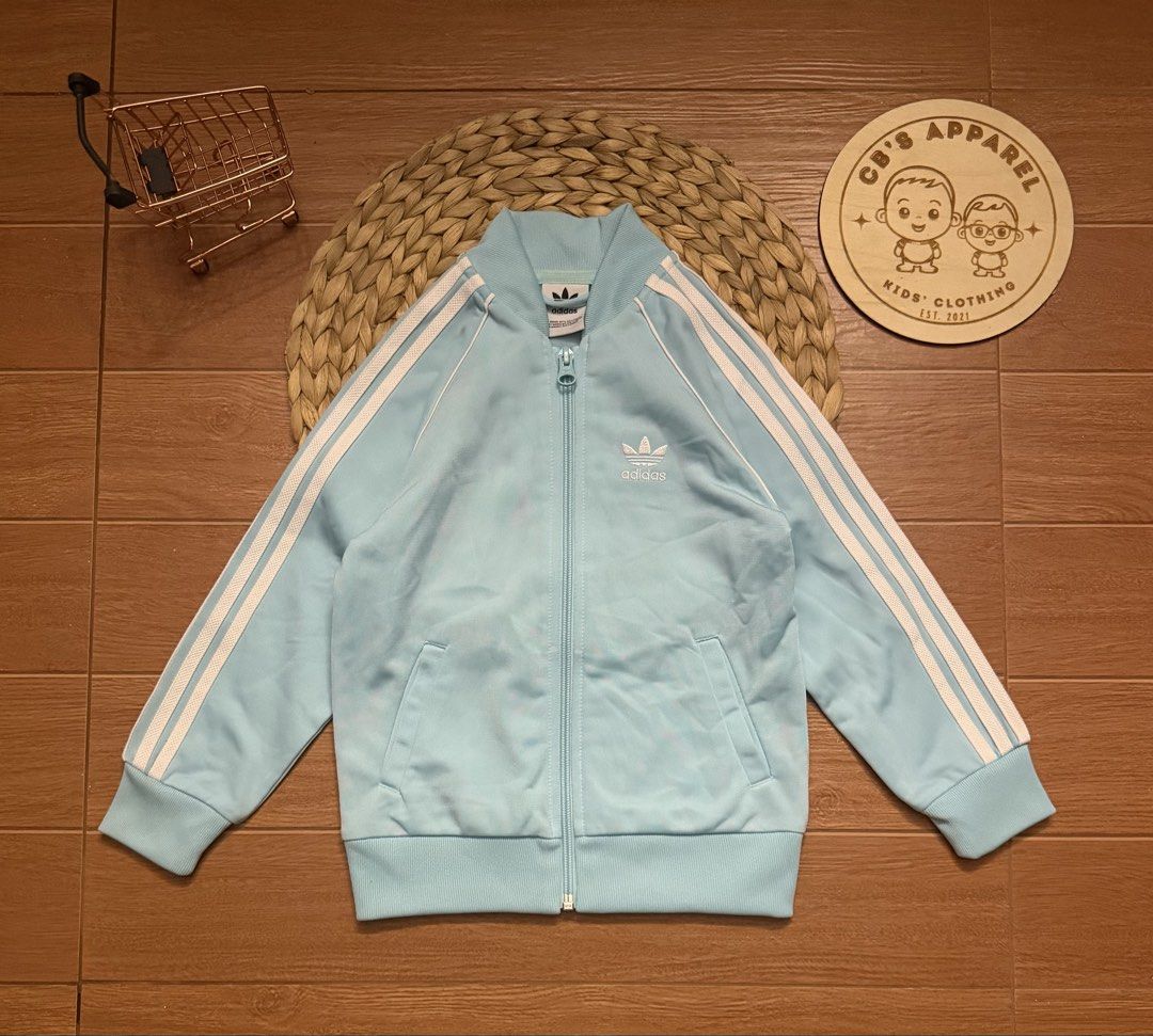 Adidas tracksuit jacket (Category: Babies & Kids Fashion) located in Valenzuela. Submitted by cbsapparel829 (Listing ID 1469730303, Image 1). Description: As new min dirt sa sleeve see next photo.