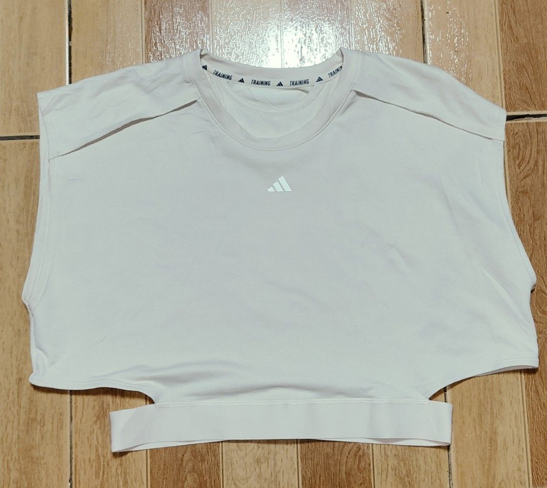 Adidas Training Crop Top White (Category: Activewear) located in Kabankalan. Submitted by stylesavy (Listing ID 1469629504, Image 1). Description: - Brand: Adidas -w16.5 x L21 (Large on tag) - Color: Off-White - Style: Training crop top / sleeveless cap cut - Neckline: Crew neck with interior training branding - Design: Elastic underband with trendy cutout back - Material: Lightweight athletic fabric - Condition: Excellent / Brand New - Perfect f