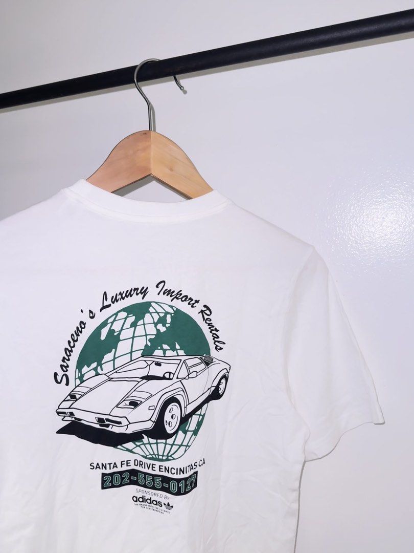 Adidas White Graphic T-Shirt (Category: Tshirts & Polo Shirts ) located in Quezon City. Submitted by coolmomma (Listing ID 1469739002, Image 3). Description: Good as new Length 27 in..