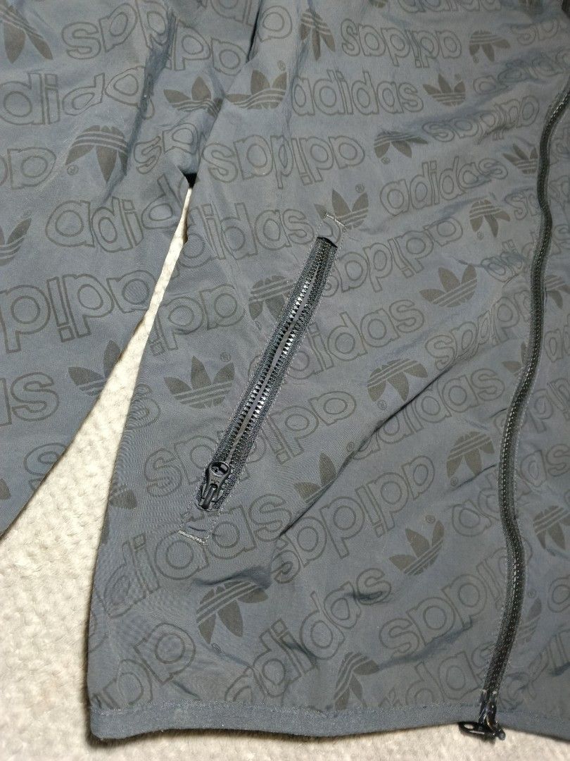 Adidas Windbreaker/Jacket (Category: Coats, Jackets and Outerwear) located in Cebu City. Submitted by authenticgrids (Listing ID 1469716087, Image 3). Description: ADIDAS AOP WINDBREAKER/Jacket Excellent/Like New Condition✨ Issue/s: None Size on Tag 🏷️ Medium Dimensions Width 22 inches Length 28 inches 📥📥📥📥📥 DM us for more details.