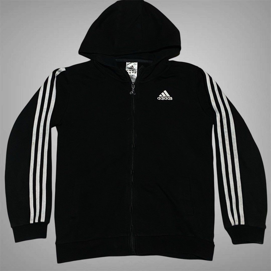 Adidas Zip Jacket (Category: Coats, Jackets and Outerwear) located in Mabalacat. Submitted by stellargarments (Listing ID 1469734589, Image 1). Description: Length : 24 Width : 19 Condition : 8.5/10 solid burda all logos working zipper with 2 pockets cotton fabric medjo lukot pa po need wash fresh from bale color may vary due to lighting minimal lints pero hindi pansinin since black din .