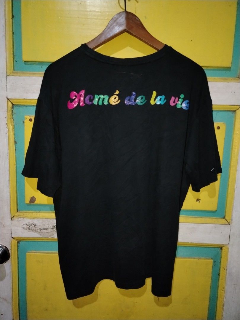 ADLV Black Donut Graphic Tee Size L (Category: Tshirts & Polo Shirts ) located in Caloocan City. Submitted by vincefresn21903 (Listing ID 1469668046, Image 2). Description: - Brand: Acme de la Vie (ADLV) - Color: Black - Size: L (Relaxed streetwear fit) - Material: Soft, premium cotton - Design: Subtle graphic print on the front chest and bold multicolored lettering on the back - Authenticity: Verified neck and size tags attached.