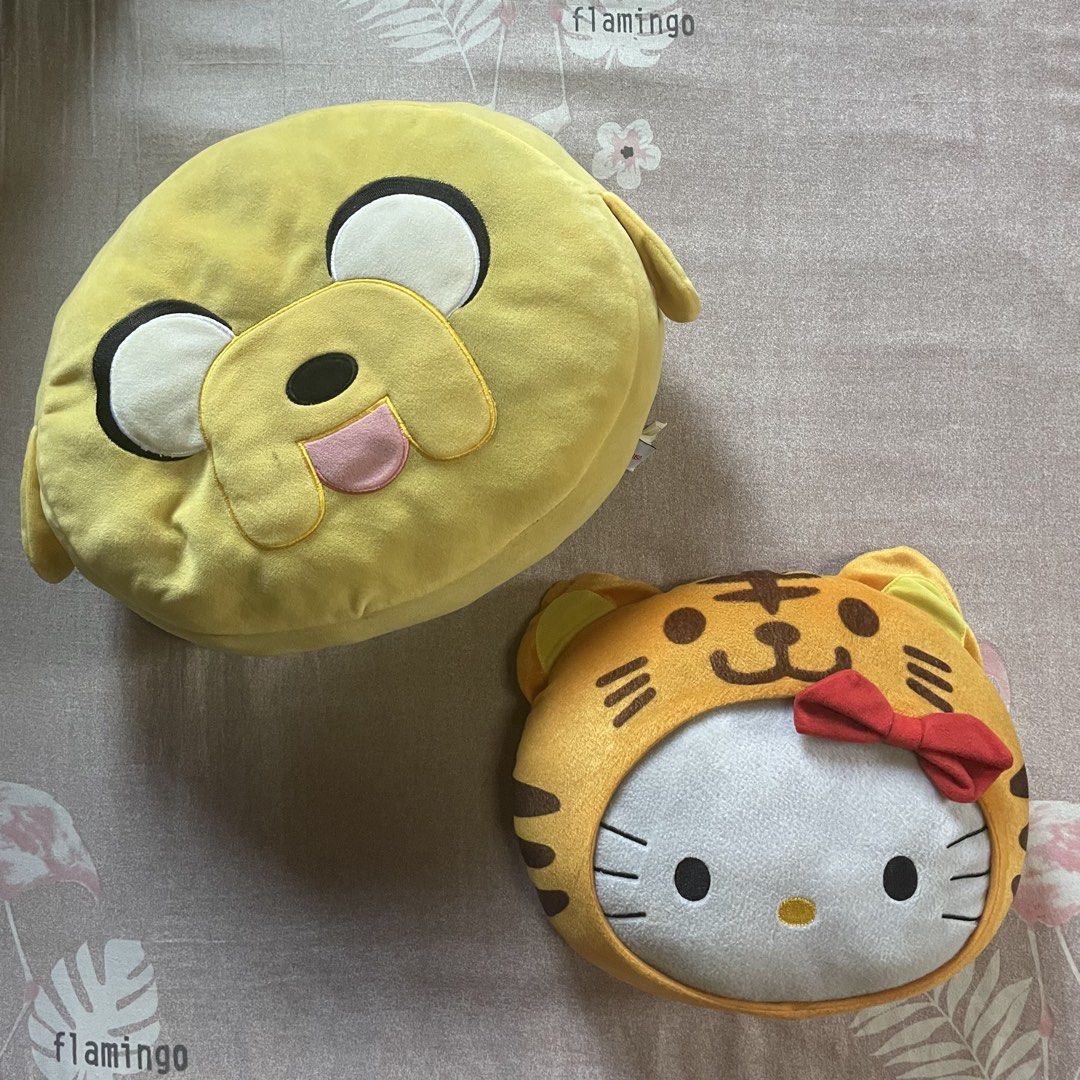 Adventure Time Jake and Hello Kitty Tiger Plush Pillows (Category: Plushies & Soft Toys) located in Quezon City. Submitted by bookscostudio (Listing ID 1469644211, Image 1). Description: Hello Kitty pillow (McDonald’s) - ₱500 Jake the Dog pillow (miniso) - ₱300.