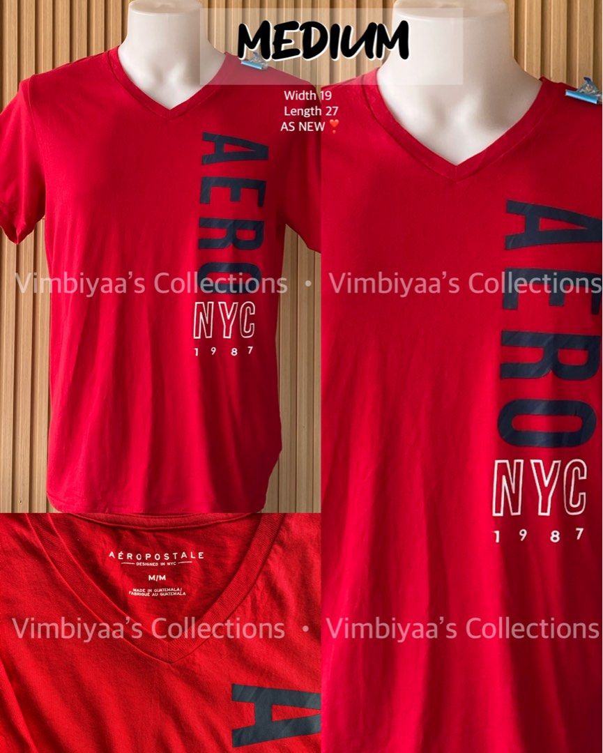 Aeropostale Red V-Neck T-Shirt Medium (Category: Shirts) located in Santo Tomas. Submitted by jjessavimj66752 (Listing ID 1469680309, Image 1). Description: - Brand: Aeropostale - Color: Red with navy blue and white print - Size: M/M (Length: 27 inches) - Design: Vertical AERO logo with NYC 1987 lettering - Material: Soft and comfortable cotton - Fit: Classic casual fit, perfect for everyday wear.