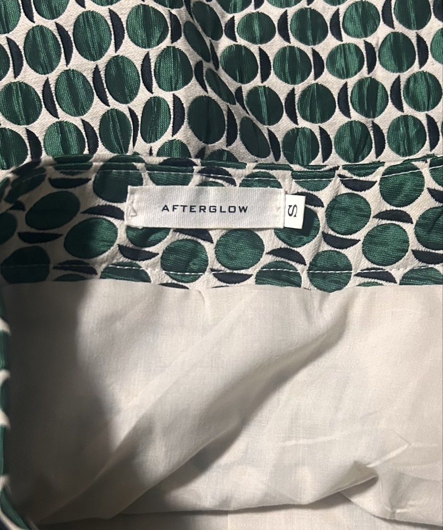 AFTERGLOW (Category: Skirts) located in Davao. Submitted by sart0ria85 (Listing ID 1469668840, Image 3). Description: Green with geometric circle print pn a structured A-line shape with a clean waistband. MADE IN KOREA 🇰🇷 SMALL. Size 4 EXCELLENT CONDITION (96/100).