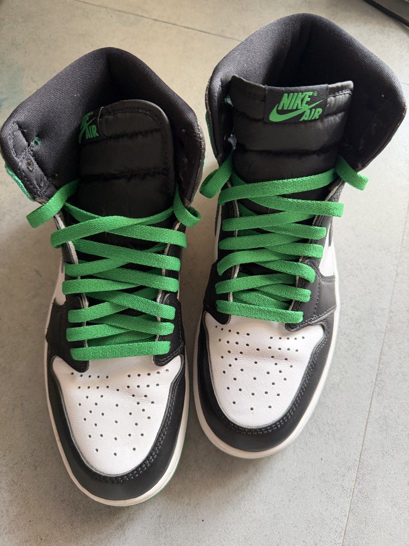 Air Jordan 1 High Lucky Green (Category: Sneakers) located in Taguig. Submitted by nicnixx (Listing ID 1469642810, Image 3). Description: - Model: Air Jordan 1 High - Colorway: Lucky Green (Black, White, Green) - Details: Nike Air tongue tag, Jordan Wings logo on ankle, green laces - Soles: White midsole with green outsole - Condition: Pre-owned with light toe box creasing from normal wear - 100% Authentic, message for more details or fast shippi