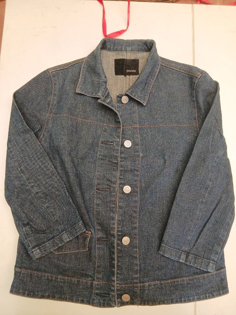 Alfaspin Blue Denim Jacket (Category: Coats, Jackets and Outerwear) located in Cainta. Submitted by chickennuggirl (Listing ID 1469589086, Image 1). Description: - Brand/Model: Alfaspin Denim Jacket - Color: Classic dark blue wash - Design: Classic collar, metal button-up front, and contrast stitching - Features: Long sleeves, two functional front pockets, and panel seam construction on the back - Fit: Structured and stylish.