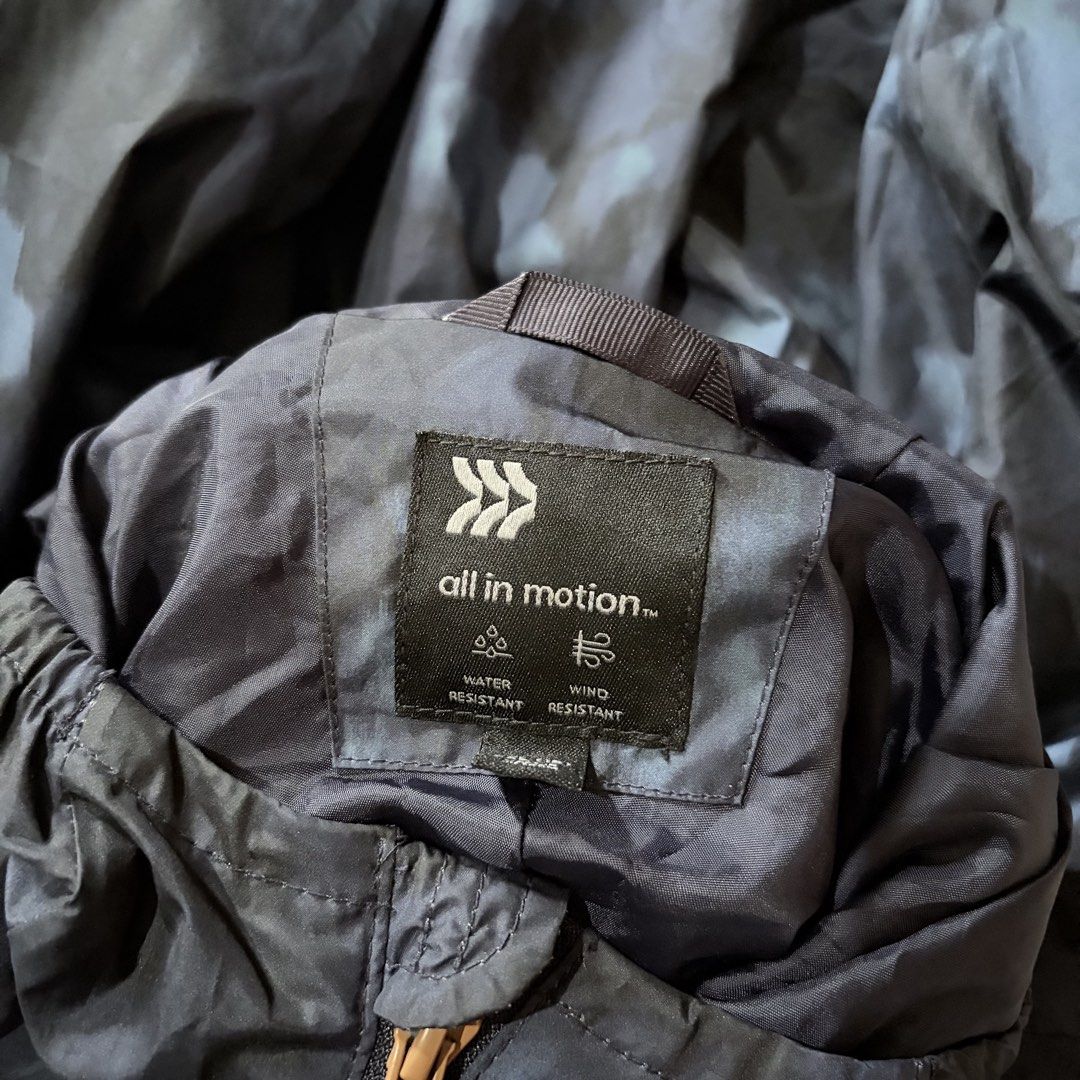 All in Motion Water and Wind Resistant Camo Jacket (Category: Coats, Jackets and Outerwear) located in Quezon City. Submitted by angelajuliet__ (Listing ID 1469620470, Image 3). Description: - Brand/Model: All in Motion Active Jacket - Color/Pattern: Navy blue camouflage - Design: Hooded with full front zip closure and secure zipped side pockets - Weather Protection: Built water and wind resistant for outdoor activities - Portability: Lightweight