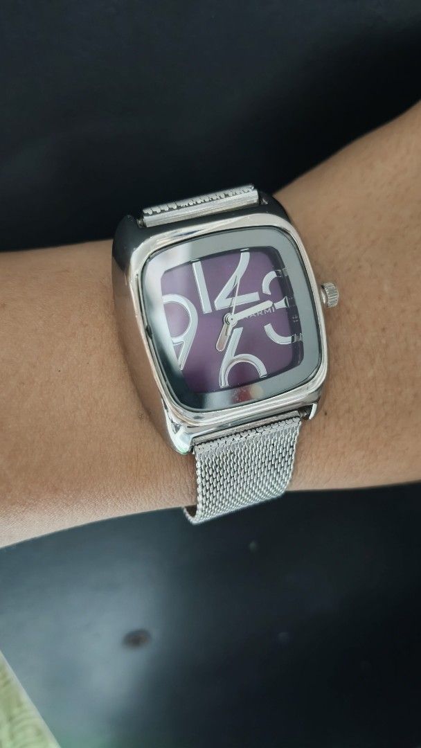 Alviero Martini Square Dial Watch with Purple Face (Category: Women's Watches) located in Taguig. Submitted by mercyeugen28914 (Listing ID 1469723880, Image 2). Description: - Brand: Narmi - Case: Silver-tone square with rounded corners - Dial: Deep purple with oversized stylish numerals - Strap: Fine silver mesh - Condition: Keeps time well, clean glass, normal everyday wear on casing.