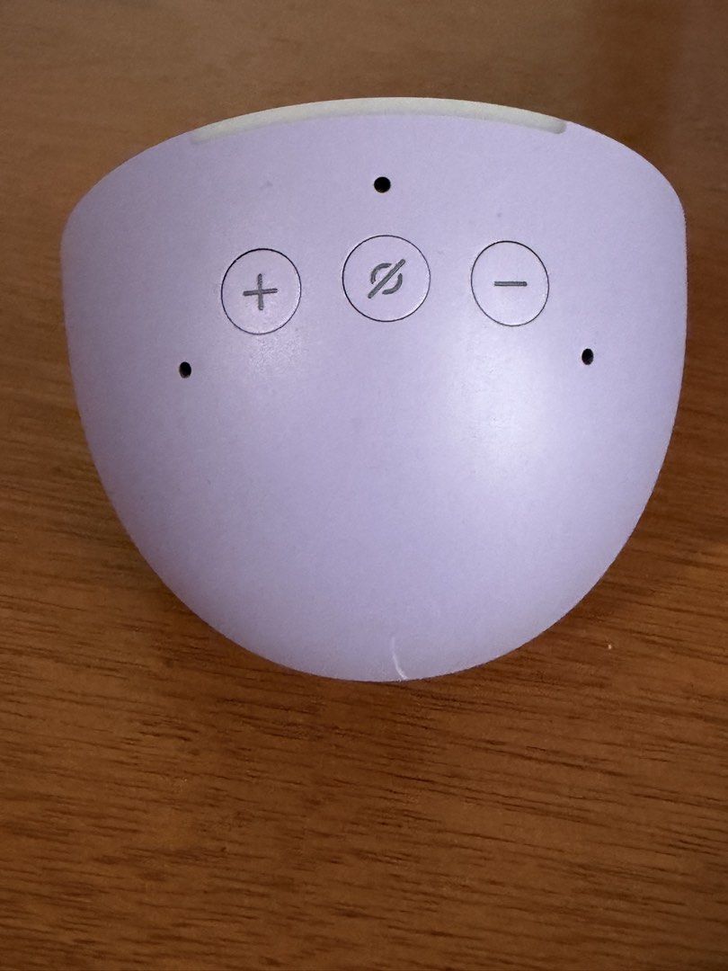 Amazon Echo Pop Purple Smart Speaker (Category: Soundbars, Speakers & Amplifiers) located in Pasig City. Submitted by bubu8282 (Listing ID 1469614198, Image 3). Description: - Model: Amazon Echo Pop - Color: Charming Light Purple - Design: Compact smart speaker with a clean fabric mesh front and smooth matte finish - Controls: Volume up/down buttons and microphone mute button on top - Features: Built-in Alexa for playing music and controlling sma