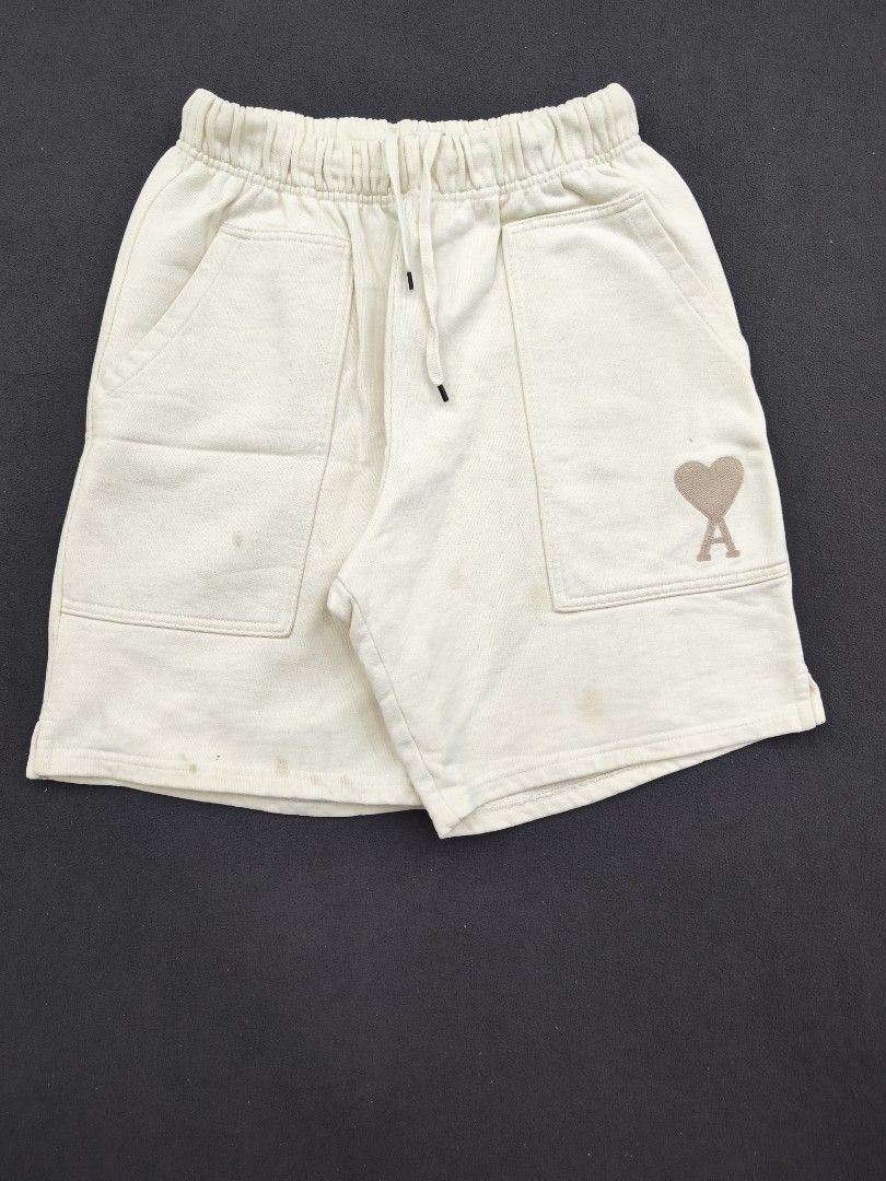 Ami Beige Cotton Shorts (Category: Shorts) located in Bulacan. Submitted by emilj23 (Listing ID 1469593850, Image 1). Description: Ami Beige Cotton Shorts Size S on tag L 19 W 28-34 Leg Hole 11.5 Condition 8.5/10 Color rate 9/10 Issue Multiple Stains.