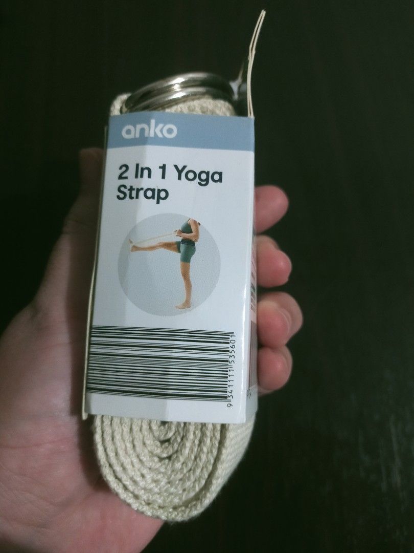 Anko 2-in-1 Yoga Strap (Category: Toning & Stretching Accessories) located in Quezon City. Submitted by mcmp1216 (Listing ID 1469680650, Image 3). Description: Brand: Anko Type: 2-in-1 Yoga Strap (functions as a stretching aid and a yoga mat carry sling) Material: Woven cotton/fabric tape with D-ring metal buckles This accessory serves a dual purpose: It acts as a traditional D-ring stretching strap to deepen flexibility during yoga poses, and it