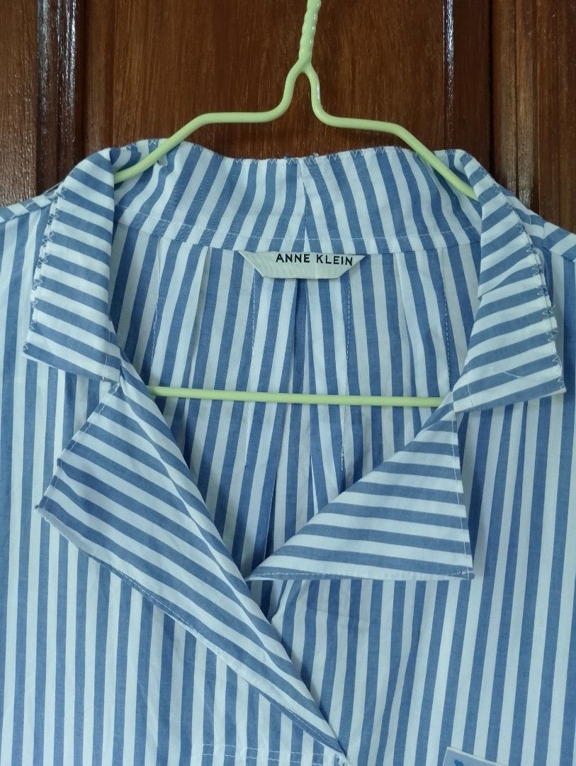Ann Klein Heritage Collection 3/4 Sleeves Top (Category: Others Tops) located in Cabadbaran. Submitted by ztsfinds (Listing ID 1469649866, Image 3). Description: Anne Klein Heritage Collection Striped Cotton Blouse - It features a timeless blue and white vertical stripe pattern, elevated by a striking, colorful abstract floral patch pocket on the chest. -Made of 100% premium, breathable cotton—perfect for keeping cool while looking put together. 