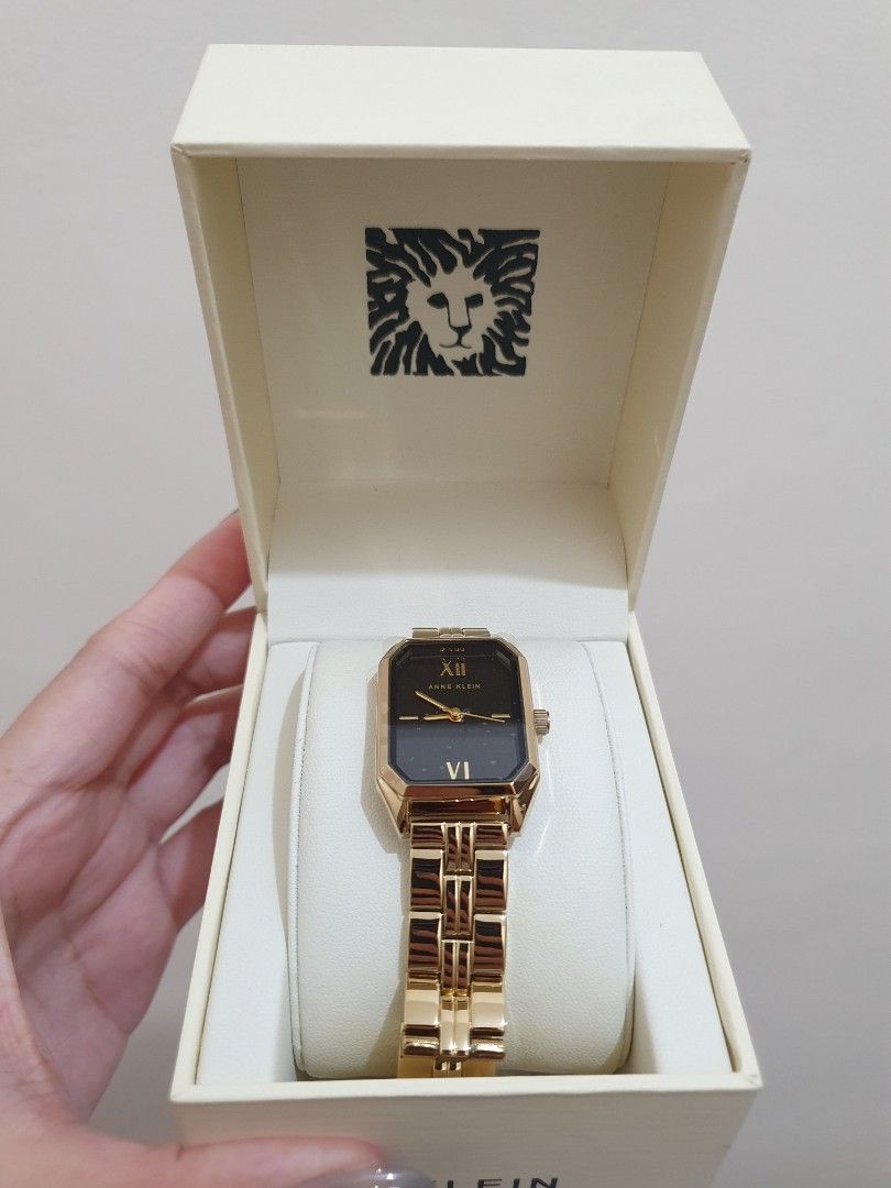 Anne Klein Gold Watch (Category: Women's Watches) located in Manila. Submitted by crypton29 (Listing ID 1469592658, Image 2). Description: - Brand: Anne Klein - Inclusions: Comes with the original box - Condition: Excellent. Bought but NEVER USED - Mode of Payment: GCash, BPI - Shipping: Via J&T (Buyer shoulders shipping fee) or Meet-ups within Metro Manila RFS: Hindi bagay sakin yung gold 😅.