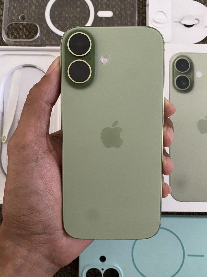 Apple iPhone 17 Green 256GB with Accessories (Category: iPhone 17 Series) located in Bulacan. Submitted by retapmoves007 (Listing ID 1469713498, Image 1). Description: Apple iPhone 17 in green with 256GB storage capacity. Battery health is at ninety percent with 344 cycle counts. Includes original retail box, USB-C charging cable, SIM ejector tool, and two MagSafe compatible protective cases in clear and mint green. Screen and body inspected, ful