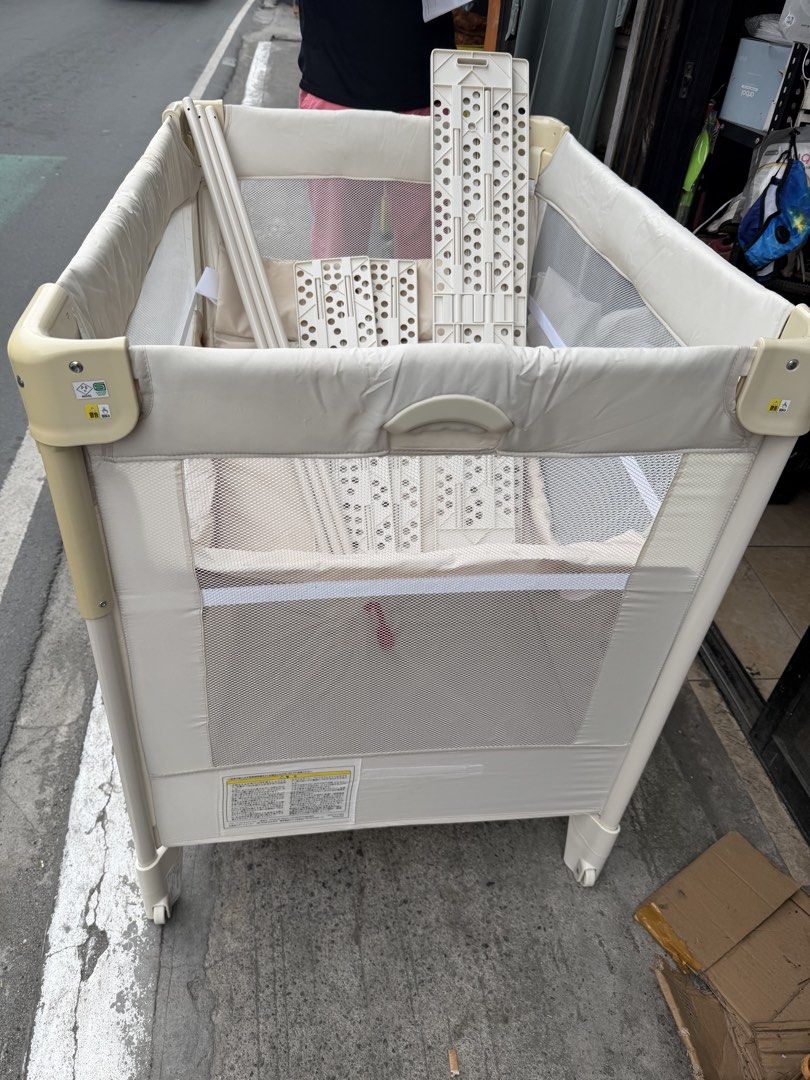 Aprica Coconel handy Collapsable Baby crib (Category: Cots & Cribs) located in Paranaque City. Submitted by edszz (Listing ID 1469579791, Image 1). Description: Aprica Coconel handy Collapsable Baby crib Good condition With manual Odorless Pwedeng pwede sa maselan .