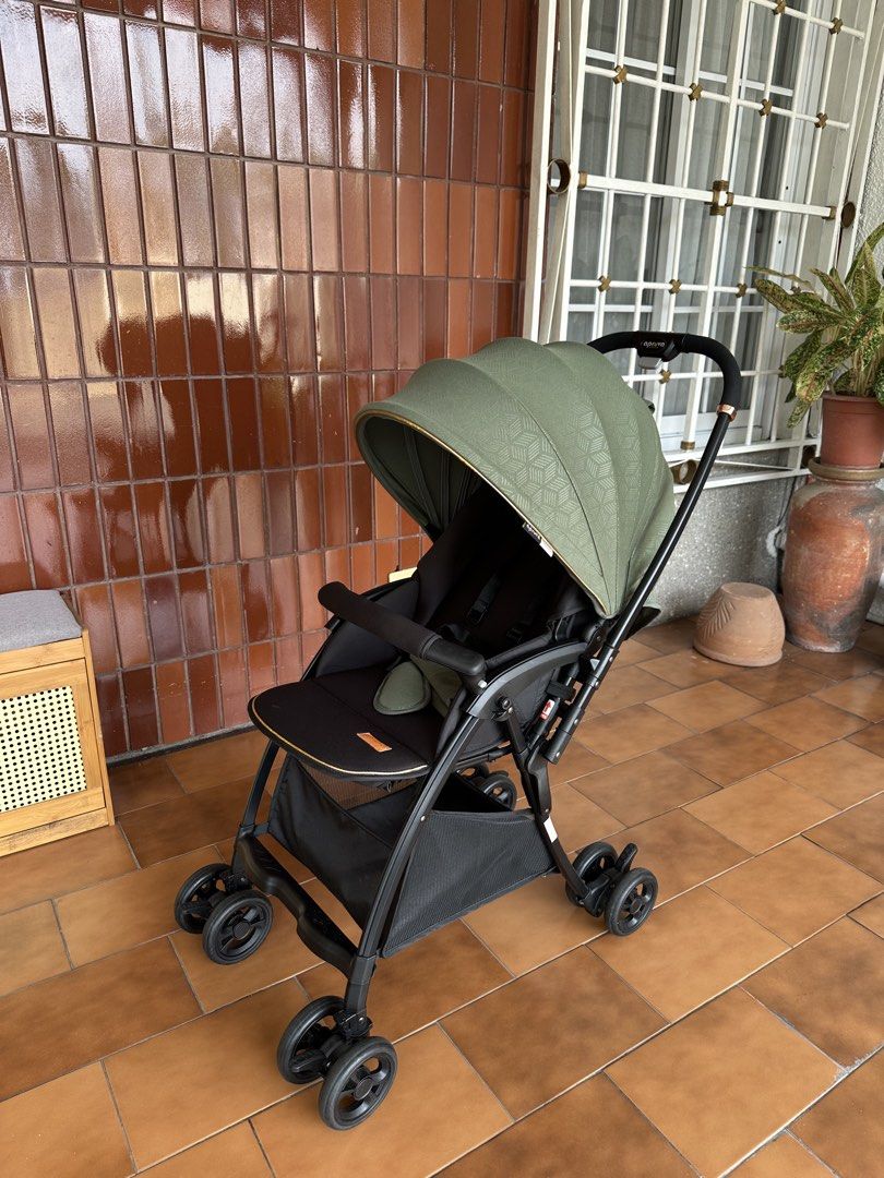 Apruva Green Lightweight Reversible Stroller (Category: Strollers) located in San Fernando. Submitted by abbp______ (Listing ID 1469598277, Image 1). Description: Full reclining seat w/ adjustable footrest * Compact and one hand folding * Detachable armbar * Lockable rear wheels * Five - point safety harness with comfort pad * Large storage basket Rarely used (mostly indoors) 9/10 condition complete with box Bought for 7k at SM Baby Company .
